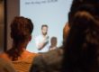 Speaker presenting a presentation